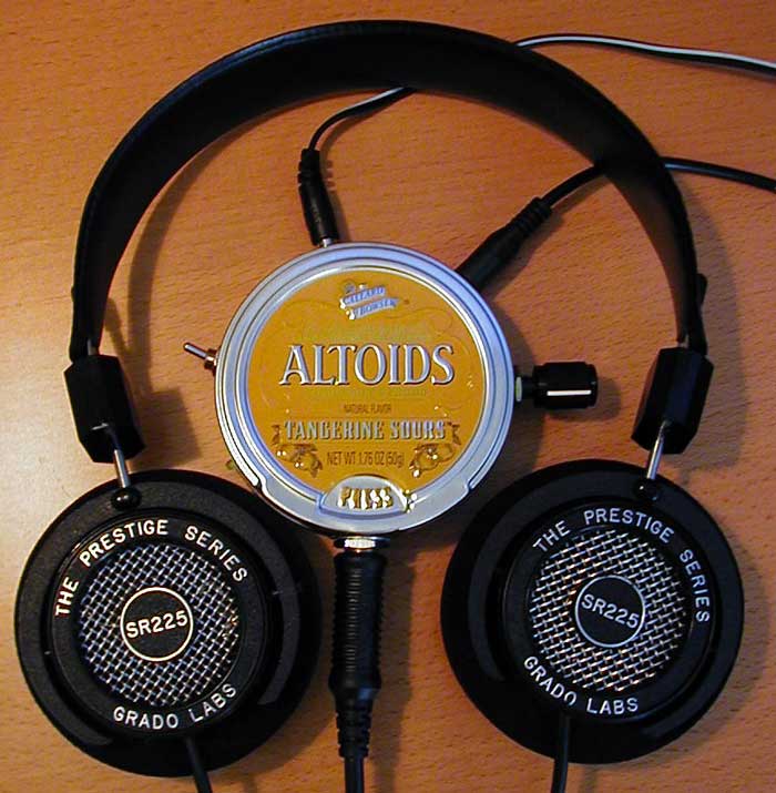 The Apheared 47 amplifier in an Altoids Tangerine Sours mint tin.